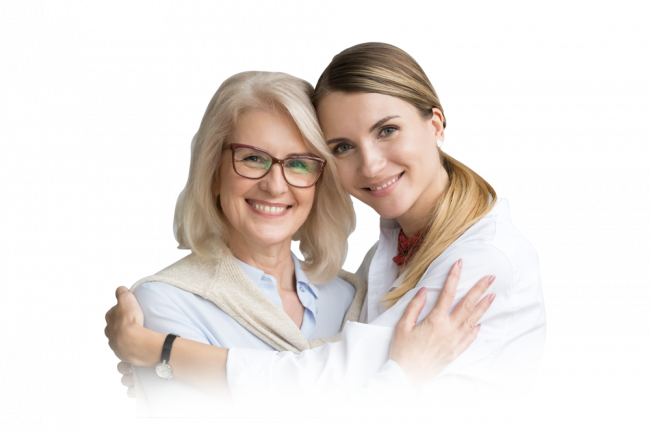 A mom and her daughter smiling together after learning dental implant cost Regional Dental Center Jacksonville, AL